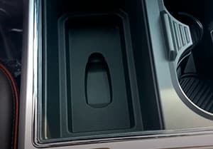 key slot under a liner in one of the cupholders