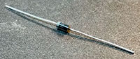 One longer arm of the diode is most likely a brighter silver color